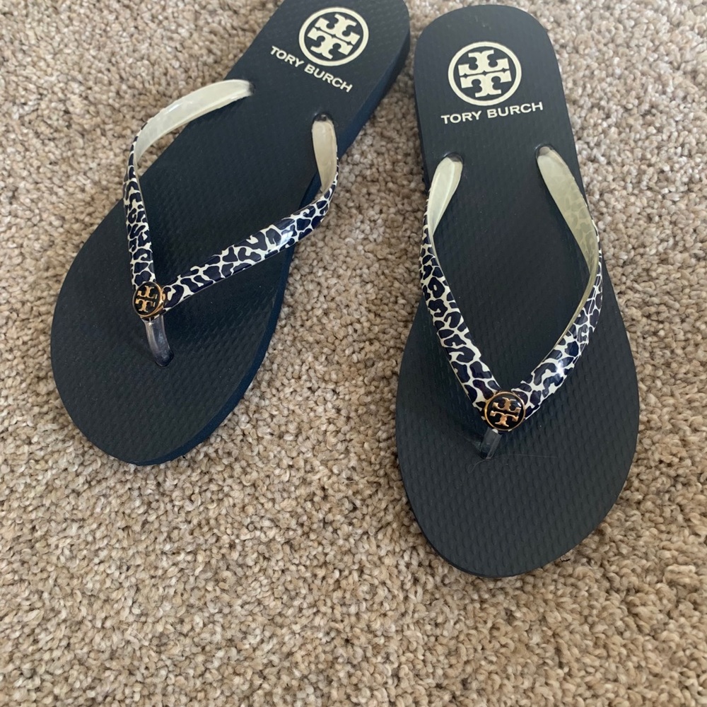 Tory Burch animal print flip flops